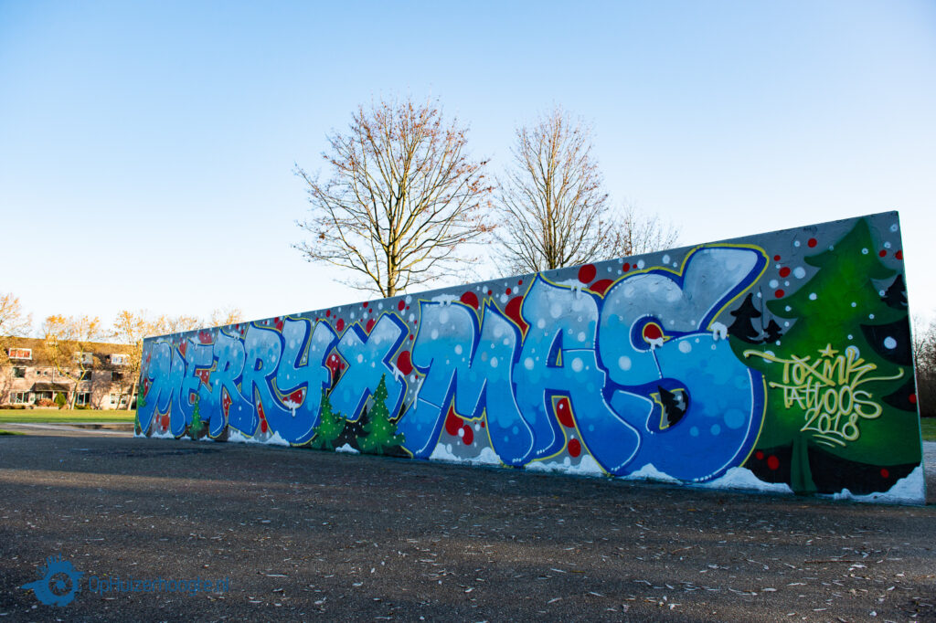 Kerstgroet van Toxink Tattoos uit Bussum op de graffitimuur uit 2018